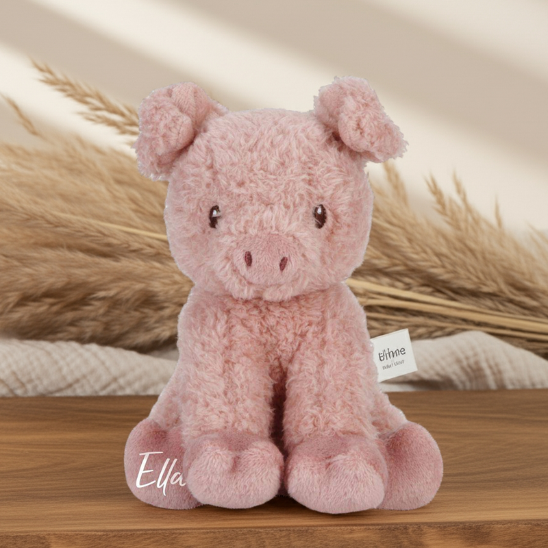 Personalisiertes rosa Kuscheltier Schwein mit Namen als liebevolles Geschenk zur Geburt für Babys.